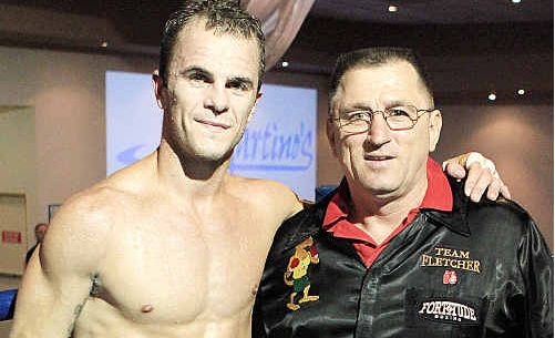 Jarrod Fletcher and his coach Steve Deller after Fletcher’s impressive win in Sydney on Friday night. Jarrod Fletcher and his coach Steve Deller after Fletcher’s impressive win in Sydney on Friday night.